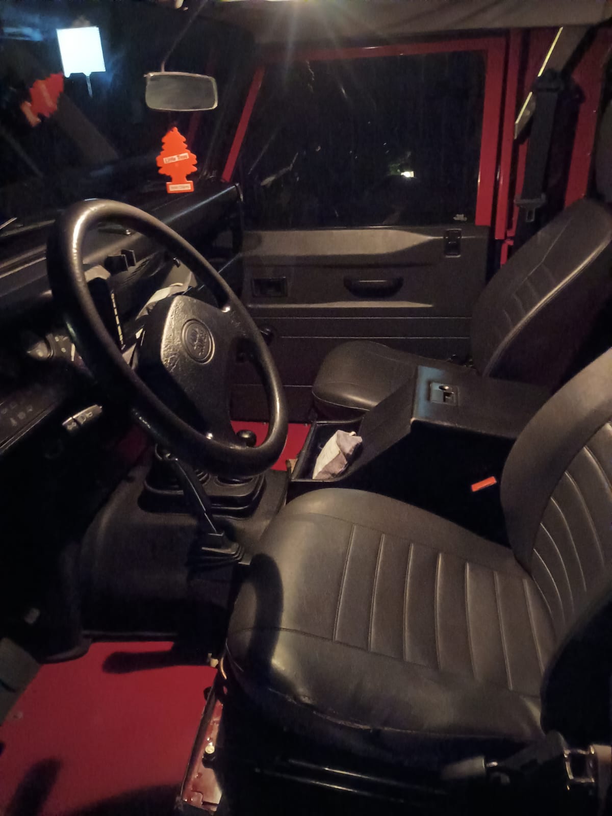 Interior — original steering wheel and seats